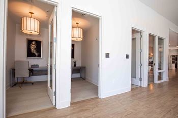 A view of the living room and dining room from the hall way